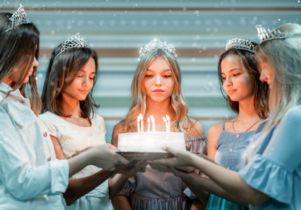 istock Cute birthday girl with cake 1670750247