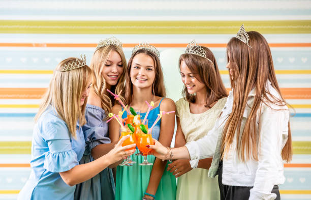 istock Girls drinking cocktails 1670750800