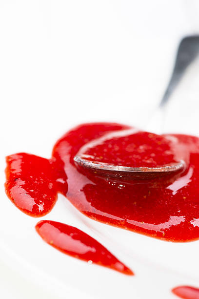 istock Close up strawberry jam and spoon 167079604
