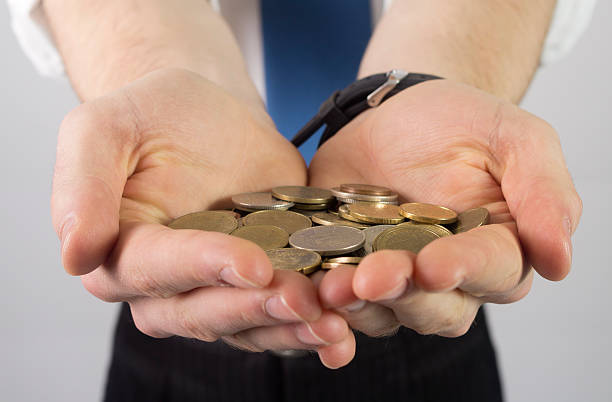 istock Businessman Holding Coins 167081163