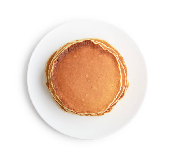 istock Pancakes on the  plate isolated 1670816388