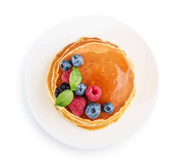 istock Pancakes with fresh berries and maple syrup 1670816393