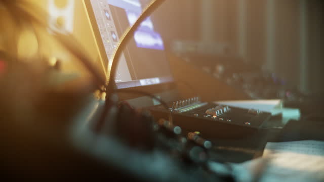 Sound mixer and computer monitor in music studio