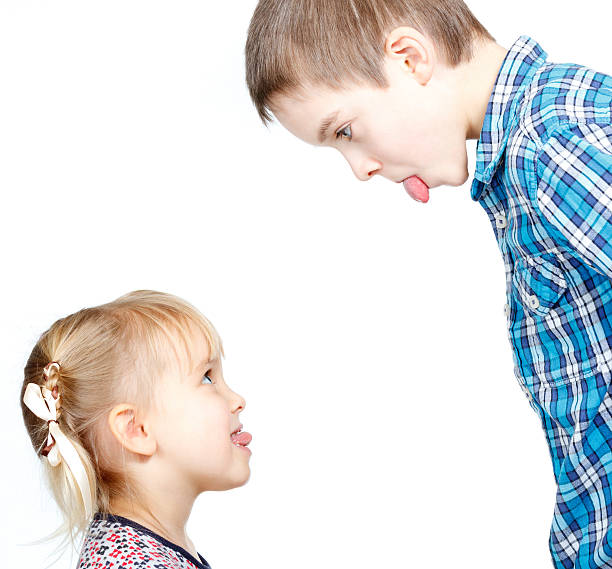 istock Children sticking out tongues 167084182