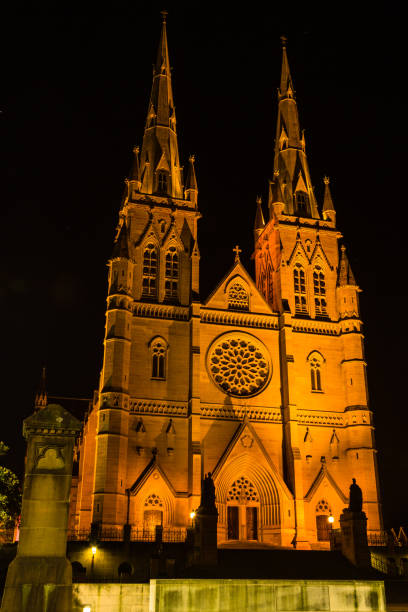 istock St. Mary's Cathedral lit up at night in Sydney, Australia 1670842407