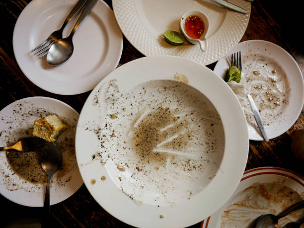 istock Dishes are messed up after eating on the table. 1670850484