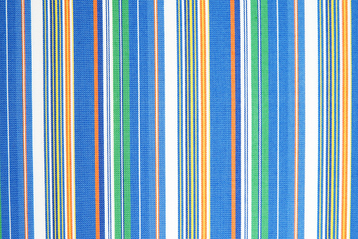 colorful striped fabric cotton texture pattern design for shirt, skirt, curtain, tablecloth, napkin, pillow case, cushion, sofa bed, couch, wallpaper interior decoration closeup stock photo