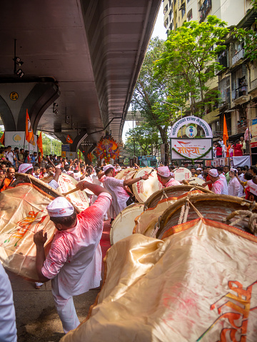 Mumbai, India - September 09,2022: Traditional Musical Band to bid adieu to Lord Ganesha during Ganesh Visarjan which marks the end of the ten-day-long Ganesh Chaturthi festival.