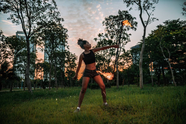 istock Fire Dancers at an Urban Park 1671032980
