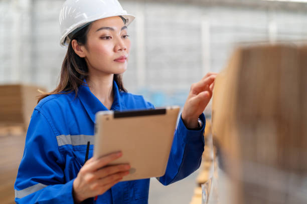 istock Production manager walking in the manufacturing using digital tablet to inspect and uphold stringent quality control standards. Fusion of technology and manufacturing serves as a tool for real-time monitoring, data analysis. 1671062645