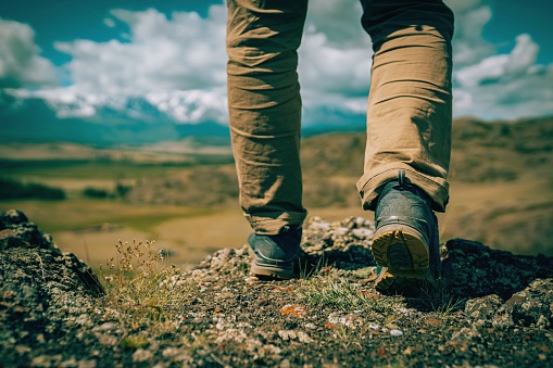 Mens footsteps in the mountains