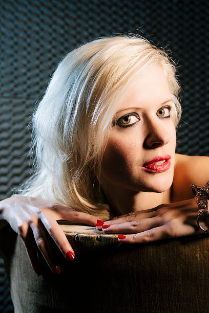 istock Blond Woman On Couch 167116069