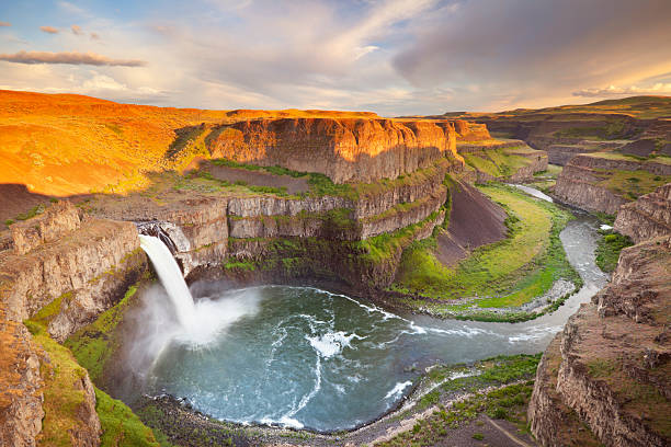 Palouse Falls in Washington, USA at sunset The Palouse Falls in Washington, USA, photographed in beautiful evening sunlight. whitman county washington state stock pictures, royalty-free photos & images