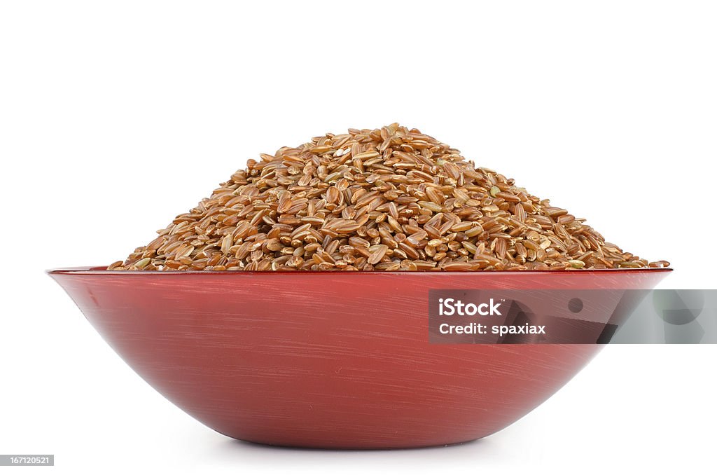 Marrón de arroz en un tazón - Foto de stock de Alimento libre de derechos