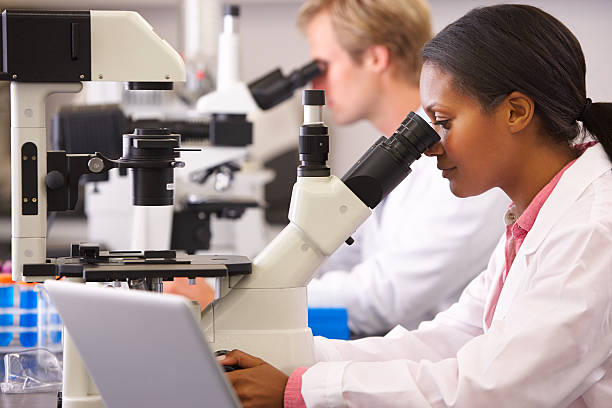 Black Using Microscope 3,200+ Black Woman Microscope Stock Photos, Pictures & Royalty-Free ...