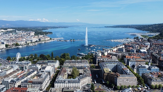 Here is a beautiful picture of the city of Geneva with the mythical water jet and the lake in the background.
