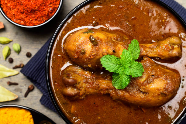 istock Indian style chicken curry masala in bowl 1671225209