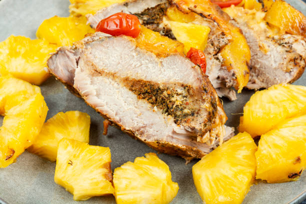 istock Pork meat baked with pineapple. 1671304432