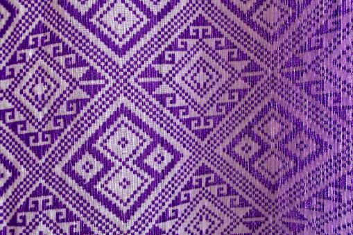 Background with traditional fabric patterns of Thailand