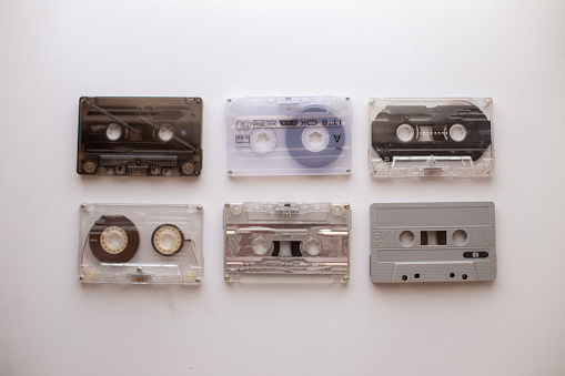 Vintage Cassette Tapes, 90s Music.Vintage audio cassette tape isolated on white background, flat lay.