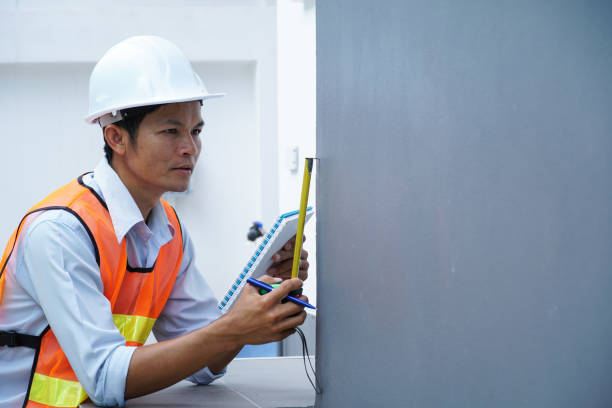 istock engineer inspecting house damage for claim the damage. 1671367758