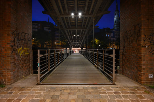 Hamburg, Germany - June 13 2023: Kibbelsteg Bridge Illuminated at Night.