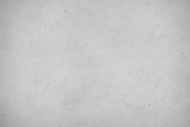 istock Concrete on stone texture for background in black, grey and white colors. Cement and sand wall of tone vintage. Close up retro plain white color concrete wall or grey colour texture cement stone work 1671406046