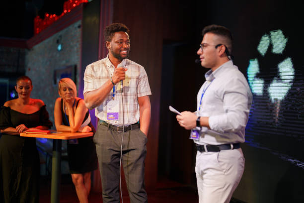 istock Speekers talking on stage with microphone 1671448514