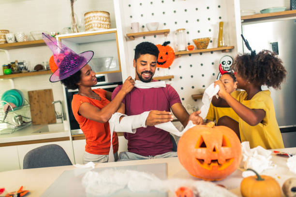 istock Family has fun in Halloween time 1671490744