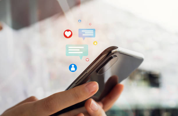 istock Hands holding smartphone with using a social media on mobile, typing message and comment to communicate. 1671494441