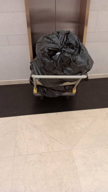 istock The black garbage bag in the trolley 1671505054