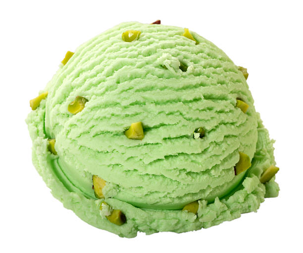 Pistachio ice cream ball Pistachio ice cream scoop,isolated on white background clipping path included scoop shape photos stock pictures, royalty-free photos & images