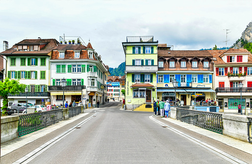 Lucern- May 17 ,2023 : Colorful Historical buildings with frescos at picturesque square Muhlenplatz ,Switzerland.