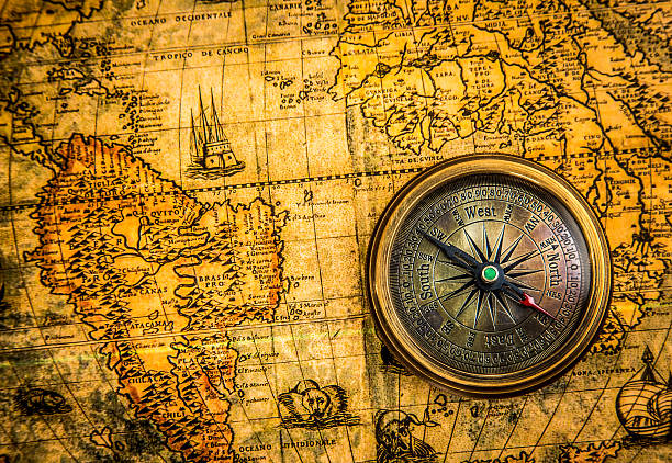 istock Vintage compass lies on an ancient world map 167159026