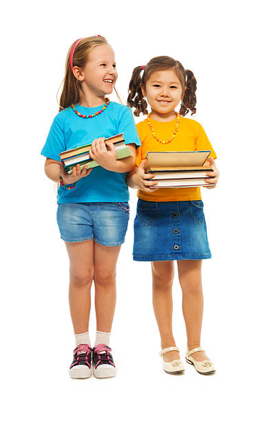 istock Two happy clever girls 167160324