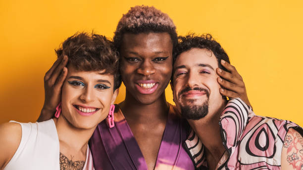 istock Multiracial LGBTQ people smiling at the camera together 1671603349