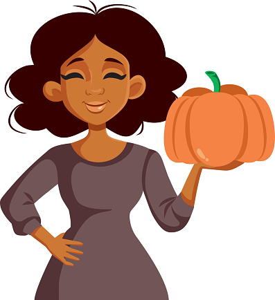 Cheerful girl holding a squash ready to prepare make it into a pie