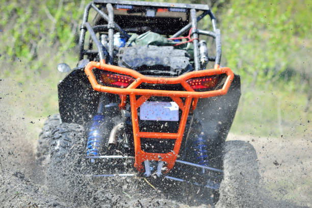 ATV, UTV, buggy, 4x4 off-road vehicle in mud and dust. Extreme, adrenalin
