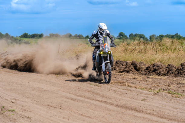 istock Motocross rider riding on extreme dust track 1671630488