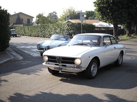 Morimondo, Italy - September 10, 2023: Parade of vintage cars through the streets of the city