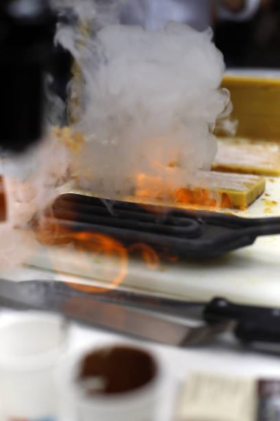 istock expert burning sugar to make traditional egg yolk nougat 1671657977