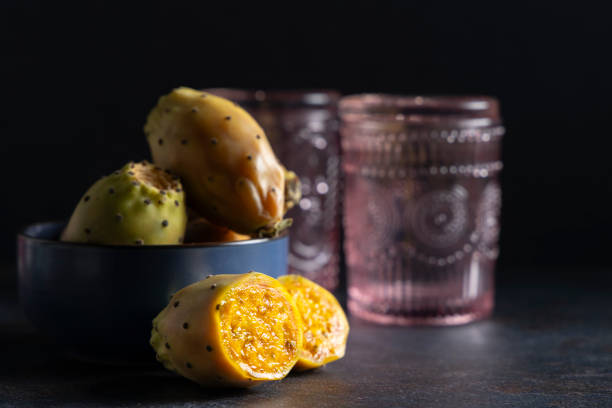 Freshly harvested prickly pears. The prickly pear is the fruit of the nopales cactus, the fruit has a delicious juice and lots of vitamins and minerals. fico d'india stock pictures, royalty-free photos & images