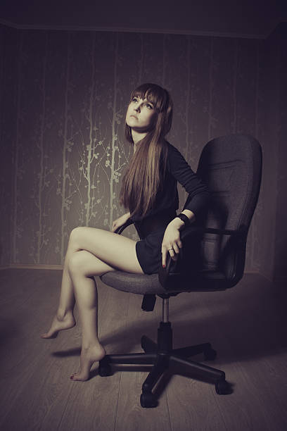 istock Sad girl in chair 167167366