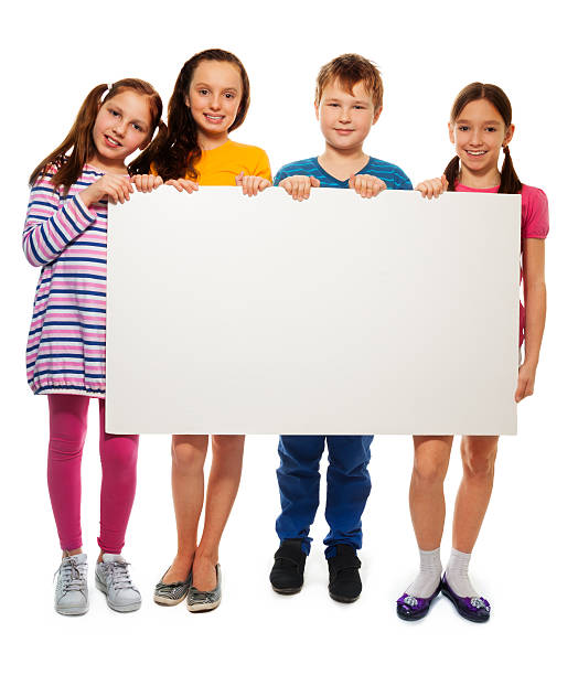 istock Four kids showing board with advertising 167167820