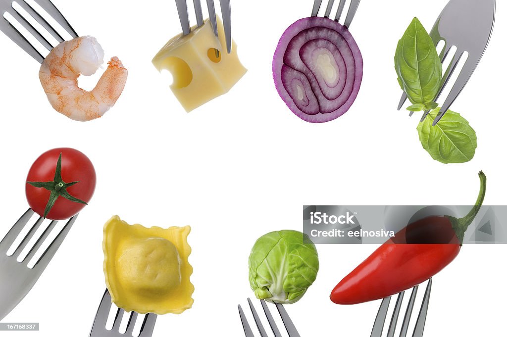 healthy food border on white healthy balanced food on forks in a border with copyspace isolated against white Food Pyramid Stock Photo