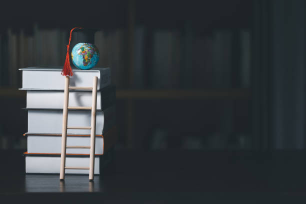 istock Graduated study abroad international Conceptual, Graduation hat on top Earth globe model map.Congratulations to graduates, Studies lead to success in world wide.Back to School. credited world by NASA 1671686474