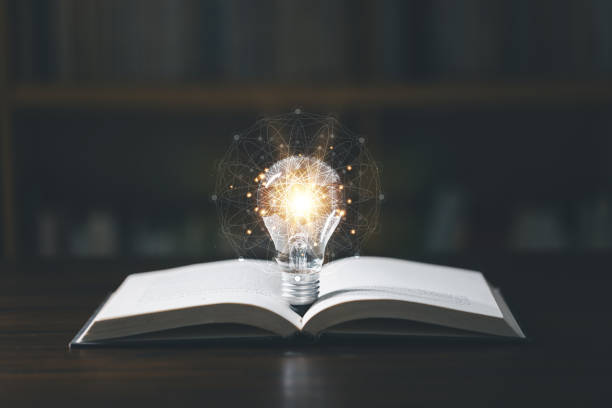 istock Light bulb with book, Idea concept for innovation idea, power of knowledge, power of reading, Self-learning, education knowledge. Internet education course degree, Idea of learning online class. 1671686500