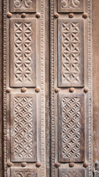istock Geometric pattern in relief carving wood 1671688424