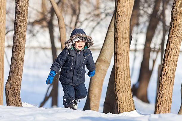 istock Cute boy in the winter park 167170277