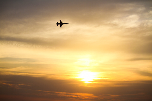 Sunset and Air Force aerobatic